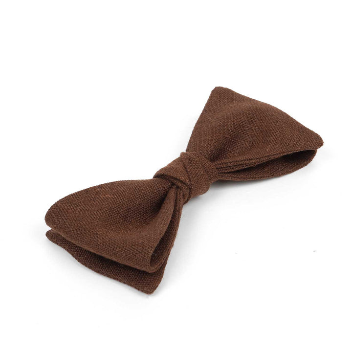 Rustic brown linen pre-tied bow tie by Hemmitie, isolated on a white background.
