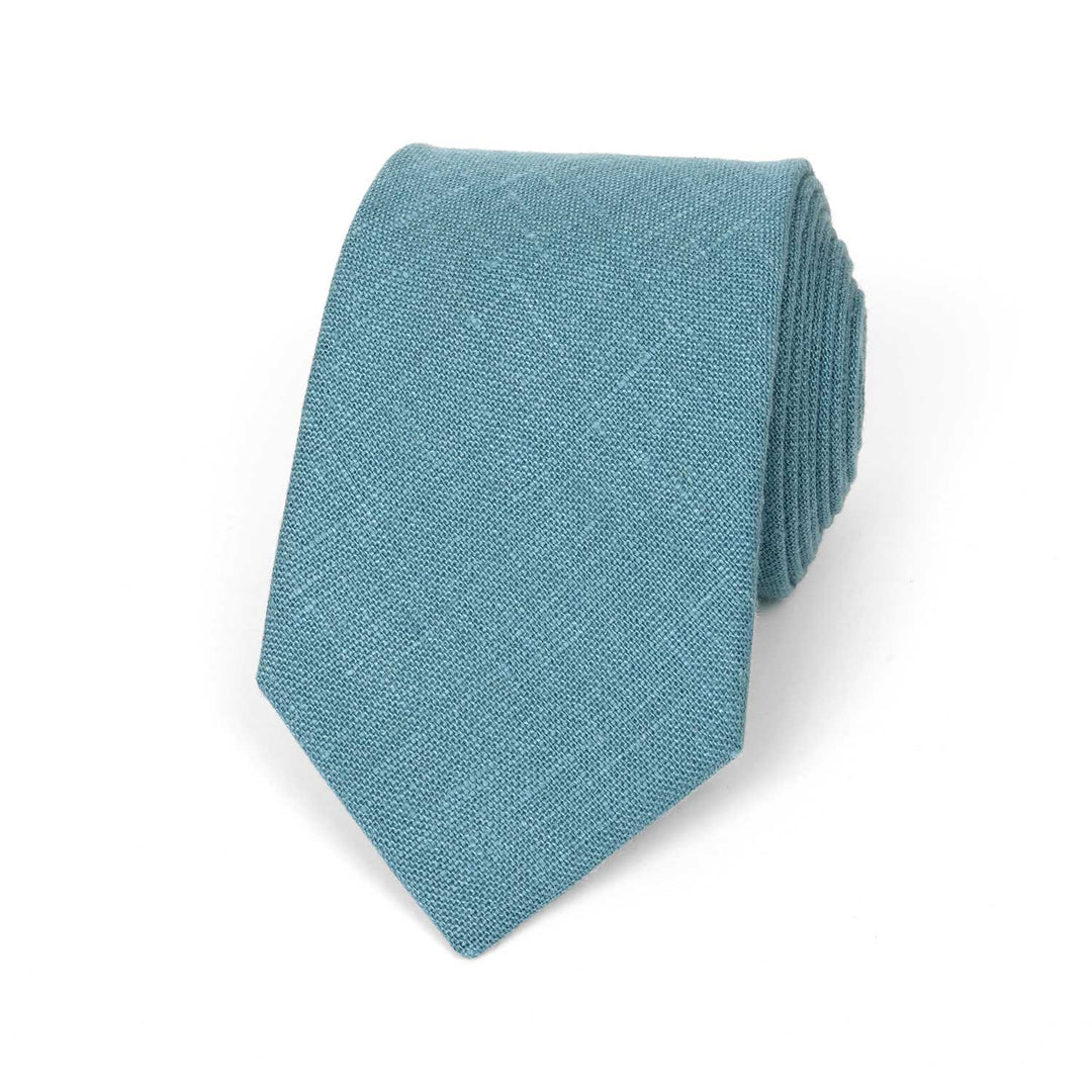 A modern 7cm width blue teal linen necktie with a visible textured weave, displayed horizontally on a solid white background.